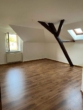 Traumhafte 2-Raum-Dachgeschosswohnung in Olbersdorf - Wohnzimmer