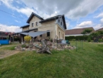 Platz für die ganze Familie – Modernisiertes Einfamilienhaus mit großem Grundstück in Oderwitz - Haus hinten