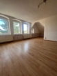 Helle 3-Raum-Dachgeschosswohnung mit besonderem Charme in Großschönau - Wohnzimmer