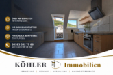 Gemütliche Dachgeschosswohnung mit Balkon und Einbauküche in Aue - Titelbild