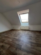 Günstige 2-Zimmer-Dachgeschosswohnung in zentraler Lage von Neugersdorf - Wohnzimmer