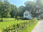Landhausidylle am Bach – Wohnen im Grünen nahe der deutschen Grenze - Seitenansicht II.jpg