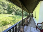 Landhausidylle am Bach – Wohnen im Grünen nahe der deutschen Grenze - Terrasse II.jpg