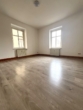 Denkmalgeschütztes Wohn- und Geschäftshaus im Herzen von Zittau – Solide Substanz mit Entwicklungspotenzial - Wohnzimmer I.jpg